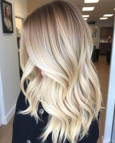 "Discover the beauty of blonde sombre with layers! 🌟✨ This stunning hairstyle features a soft, sun-kissed gradient of blonde hues, complemented by layered cuts that add movement and dimension. The sombre technique offers a more subtle transition compared to traditional balayage, creating a natural, radiant look. Perfect for those who want a low-maintenance yet eye-catching style, this combination of blonde sombre and layers will keep your hair looking fresh and effortlessly chic." Balayage Hair Bright Blonde, Low Maintenance Bright Blonde, Mid Length Blonde Hair Balayage Straight, Gradient Blonde Hair, Blonde Balayage Summer 2024, Low Maintenance Creamy Blonde, Blonde Balayage Mid Length, Traditional Balayage, Bright Blonde Hair With Shadow Root