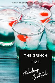 the grin fizz holiday cocktail is ready to be served in glasses with red, white and blue liquid