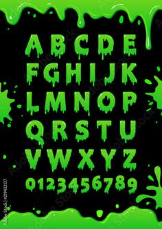 an alphabet with green paint on it and the letters are all in different shapes, sizes and