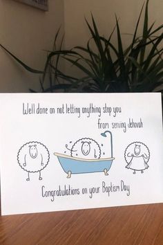 a greeting card with sheep in a bathtub