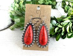 Be sure to check our shop announcements for any current sales or coupon codes!  All discount information will be posted there.  Western fashion dangle earrings: Colors- red color stones Length- Approx. 2.25" (From top of fish hook to bottom of earring) Back- Fish hook back Burnished silver metal   Distressed details Stones will vary in design.  Each is has different characteristics. Nickel and lead compliant FINAL SALE- please check dimensions and details before purchasing, just to ensure these Red Southwestern Style Earrings For Festivals, Southwestern Red Drop Earrings, Red Southwestern Dangle Earrings, Southwestern Hand-strung Red Jewelry, Southwestern Style Red Nickel-free Earrings, Nickel-free Red Southwestern Earrings, Nickel-free Southwestern Red Earrings, Turquoise Nickel-free Western Earrings, Western Earrings