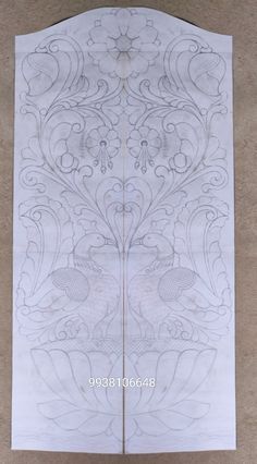 the back side of a door with an intricate design on it