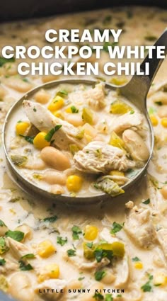 creamy crockpot white chicken chili in a pot with a spoon