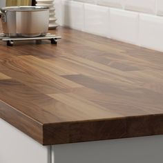 a wooden counter top in a kitchen