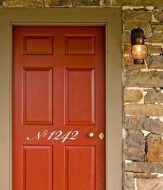 a red door with the number 942 written on it