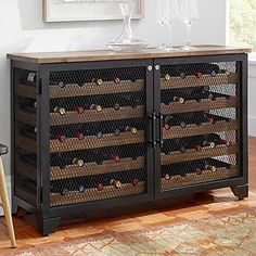 a wine rack with many bottles and glasses on it