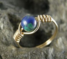 This Wire Wrapped Ring is handmade to a ring sizes 6 1/4, 7 1/2  with 20 gauge 14 k gold Filled Round Wire. The Stone is a 6 mm Green and Blue Azurite Bead Wire Wrapped Engagement Ring, Engagement Ring Wraps, Friendship Ring, Ring Wire, Friendship Rings, Wire Wrapped Rings, Ring Promise, Ring Sizes, Wrap Rings