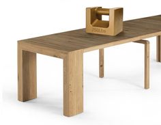 a wooden table with a box sitting on it's top and two legs that are connected to each other