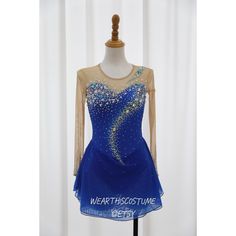 a blue dress with sequins on it