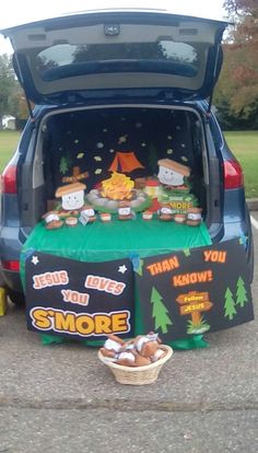 the trunk of a car is filled with food