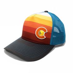 Our Sunset Fader is the newest graphic-printed hat featuring a deep red to a bright yellow gradient and a gray bill with blue contrast stitching and a green under-bill. ------------------------------------------ SHAPE --- MidProfile BRIM --- Precurved CLOSURE --- Snapback BACK --- Mesh Back FIT & SIZE --- One Size Fits Most Adults ------------------------------------------ Colorado Embroidery, Colorado Fashion, Colorado Sunset, Yellow Gradient, Colorado Outfits, Mens Trucker Hat, Flag Outfit, Outdoor Cap, Cute Hats