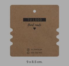 a brown tag with the words tullogo and heart made in black on it