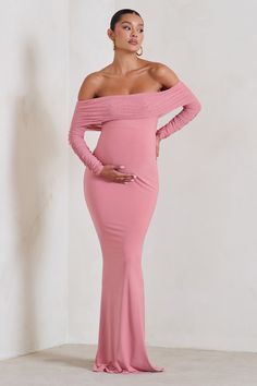 What maxi dress could be more perfect for a birthday or baby shower than this aptly-named option. Pretty Perfect? Designed in our signature stretch jersey with ruched mesh overlays. this pink maternity dress features a demure Bardot neckline. long sheer sleeves and a floor-sweeping skirt in a fishtail silhouette.Features- Premium stretch jersey and mesh- Fully ruched- Bardot neckline- Sheer mesh sleeves- Fishtail skirt- Maxi lengthSizing & FitModel is 5'8.5"and wears UK Size 8 / US Size 4Product DetailsDesigned exclusively by Club L LondonDouble layered with good stretchPremium jersey and mesh in Blush Pink (95% Polyester. 5% Elastane)153cm total lengthSKU: CL126177094 Pink Baby Shower Dress, Beautiful Maternity Dresses, Pink Maternity Dress, Maxi Dresses Uk, Bardot Neckline, Fishtail Skirt, Baby Shower Dresses, Skirt Maxi, Pregnancy Outfits