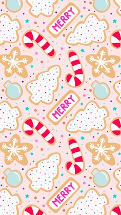 christmas cookies and candy on a pink background