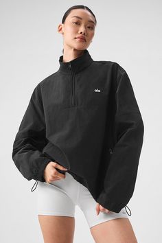 Lightweight Takeaway Track Pullover - Black Sporty Half-zip Top With Zipper Closure, Casual Half-zip Activewear, Athleisure Half-zip Track Jacket, Casual Fall Activewear With Half-zip, Casual Half-zip Activewear For Fall, Casual Half-zip Fall Activewear, Alo Yoga Athleisure Tops With Ribbed Cuffs, Streetwear Stretch Half-zip Tops, Sporty Half-zip Track Jacket With Zipper