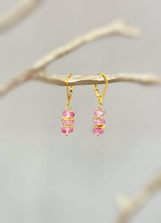 "Dainty handmade genuine Pink Topaz dangle earrings for women.  Lightweight everyday feminine earrings. Sparkling pink topaz gemstone rondelles hang from your choice of Sterling Silver, 14k Gold Fill, or Rose Gold Fill French hook ear wires or leverbacks. Gemstone drops are dainty just under 1/4\" wide. Simple, elegant everyday earrings. These would make a lovely gift for mom or wives with a November birthday also lovely bridesmaids gifts. Pink Topaz size: just under 1/4\" wide Overall Earring l Pink Crystal Round Earrings For Gift, Pink Earrings With Ear Wire For Her, Pink Jewelry With Ear Wire For Her, Pink Birthstone Round Earrings, Pink Round Birthstone Earrings, Pink Earrings With Lever Back For Anniversary, Pink Lever Back Earrings For Anniversary, Pink Birthstone Drop Earrings, Dainty Pink Earrings For Anniversary