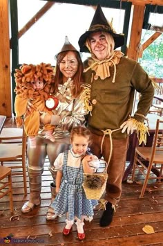 a family dressed up as scarecrows for halloween