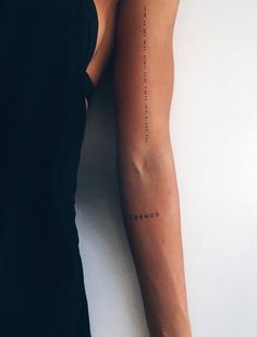 a person with a tattoo on their arm