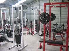 the gym is equipped with many different types of weight machines and exercise equipment for people to use