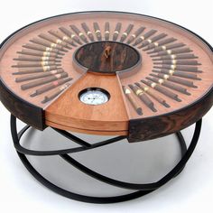 an unusual coffee table made out of wood and metal