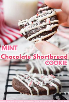 chocolate shortbread cookies with white frosting and sprinkles