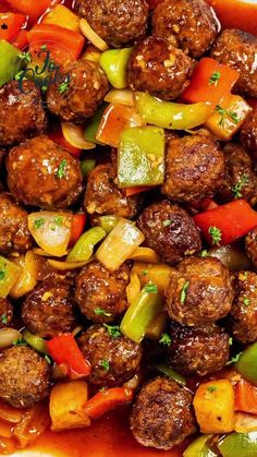 meatballs and peppers are in a red sauce