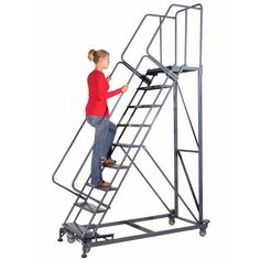 a woman is climbing up a metal stair tower with the words powder coated tour on it