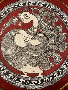 an intricately decorated plate with a bird on it's side and red background