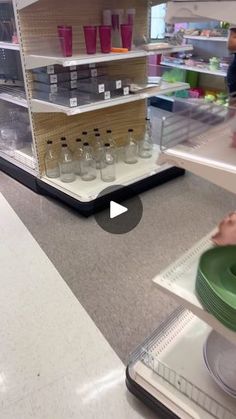 a person standing at a counter in a store