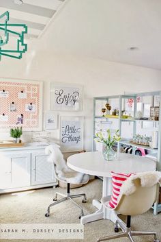 a white table and chairs in a room