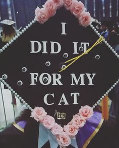 i did it for my cat graduation cap decorated with roses and pearls on the front