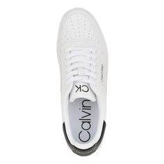 Flaunt your spory and chic style effortlessly by pairing outfits with the athletic-inspired Calvin Klein® Lento Sneakers that are crafted with faux leather upper, textile lining, and rubber insole. The modern sneakers features a lace up front, stylish round toe shape, and CK logo detailing on the side of the sneaker..Low-top design..Rubber outsole..Imported..Product measurements were taken using size 9, width M. Please note that measurements may vary by size..Measurements: Weight: 1 lb Athleisure Sneakers With Perforated Toe Box For Streetwear, Sporty Synthetic High-top Sneakers With Laces, Synthetic Skate Shoes With Contrast Sole For Spring, Spring Synthetic Skate Shoes With Rubber Sole, Athleisure Sneakers With Branded Insole And Lace-up, Athleisure Sneakers With Laces And Round Toe, Casual Calvin Klein Sneakers With Round Toe, Casual High-top Calvin Klein Sneakers, Athleisure Slip-on Sneakers With Contrast Sole