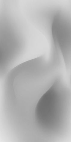 an abstract white background with smooth lines and curves in the center, as well as black and white colors