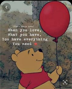 winnie the pooh holding a red balloon with quote about love and being loved by someone