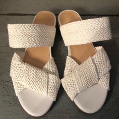 Anthropologie Slide Sandals Beautiful Woven Sandals New For Next Spring Be Ahead Of The Trends Brand New Without Box Size 7-37 Color White Retail 99.00 White Flat Heels For Beach, White Flat Heels For The Beach, White Flat Heel Mules For Vacation, White Slip-on Mules For Beach, White Slip-on Mules For The Beach, White Synthetic Mules For Summer, White Open Toe Mules For Beach, White Open Toe Mules For The Beach, White Open-toe Mules For Beach