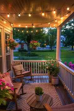 the porch is decorated with flowers and lights