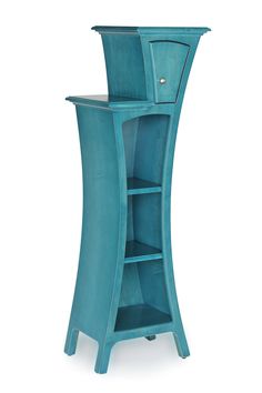 a tall blue cabinet with shelves and drawers