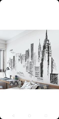 a bedroom with a large city drawing on the wall