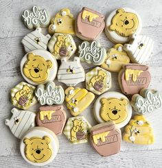 some cookies that are shaped like teddy bears and baby ones on top of each other