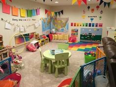 a child's playroom with lots of toys and decorations on the walls,