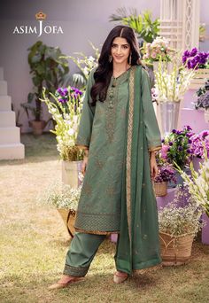 Shirt: Jumbo Silk By Pcs: 3 Pcs Trouser: Jumbo Silk Dupatta: Chiffon Color: Green Product Details Mawra Hocane is a breath of fresh air dressed in this cool sage ensemble. Embroidered in gold zari & sequins fashioned into a delicate floral pattern, topped with richly embroidered neckline & borders. The look is completed with same colored embroidered chiffon dupatta & dyed pants. DESIGN DETAILS: *Embroidered neckline on jumbo silk *30'' embroidered jaal for front with border on jumbo silk *30'' e Semi-stitched Green Chinon Unstitched Suit, Pista Green Semi-stitched Suit For Diwali, Long Sleeve Chinon Salwar Kameez For Diwali, Festive Semi-stitched Straight Kurta Salwar Kameez, Festive Kurta With Resham Embroidery In Shantoon, Festive Shantoon Kurta With Resham Embroidery, Green Georgette Sets With Dabka, Green Georgette Sets With Dabka Details, Long Sleeve Chinon Traditional Wear For Eid