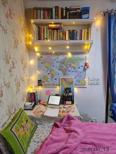 a bedroom with a bed, desk and bookshelf filled with lots of books