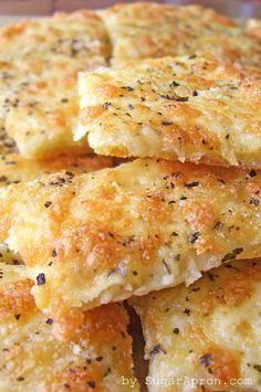 cheesy bread sticks are stacked on top of each other