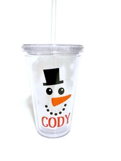 a frosty cup with a straw in the shape of a snowman wearing a top hat