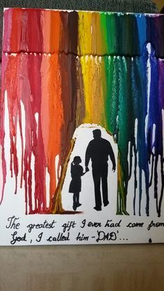 a father and his child are painted with colored crayons