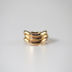 Highly polished and plated with 18k gold, the Single Wave Ring curves like a dancer with smooth movement. Each curve is lovingly crafted to create an individual gesture. Wear it solo for minimal style or dual and triple for a statement look. 18k gold plated Stainless steel base Waterproof and tarnish free Available in US size 6-8 Ring sizing chart Reunion Island, Wave Ring, Minimal Style, Original Gift, Minimal Fashion, Sizing Chart, Dancer, 18k Gold, Plating