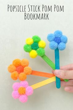 this popsicle stick pom pom bookmark is so cute and easy to make