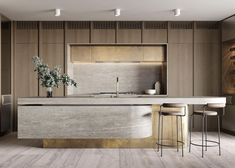 a modern kitchen with marble counter tops and stools next to an island in the middle