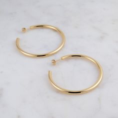 Super light weight & high quality hoop earrings that will be your go-to pair! Great for dressing up a casual outfit, or going from a day-to-night look! - - - D E T A I L S - - - * Made of 925 Sterling Silver * We use a THICK plating of 14k Gold or Rhodium * Nickel-free & Hypoallergenic * LIGHT WEIGHT * 55mm Diameter * 3.5mm Thickness Made with 100% Pure Love! ♡ Happy to answer any questions you may have! 🥰 Earrings Gold Hoop, Hoop Earrings Silver, Hoop Earrings Gold, Earrings Hoop, Large Hoop Earrings, Gold Hoops, Gold Hoop, Silver Hoops, Gold Hoop Earrings