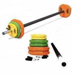 an orange and green dumbbell with black handles next to other gym equipment on a white background